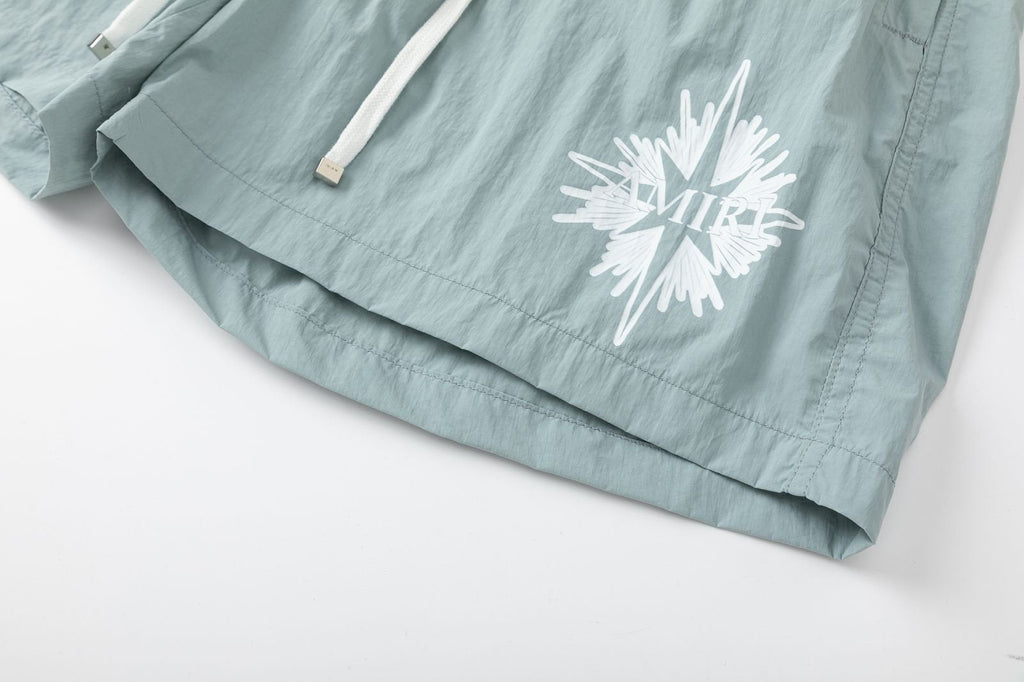 AMRI Starburst logo shell swim shorts