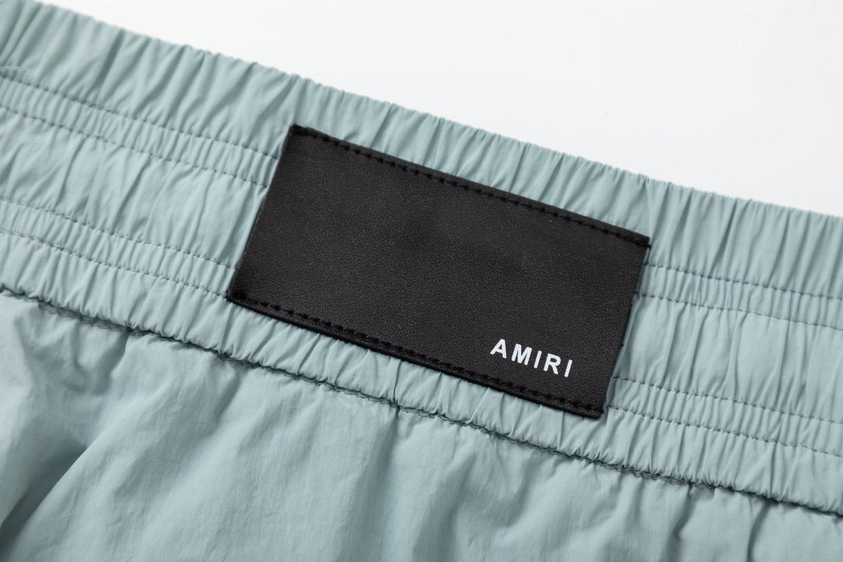 AMRI Starburst logo shell swim shorts